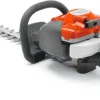 Test Husqvarna 122HD60 : le taille-haies thermique qui fait le job sans vous exploser les bras