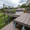 Aménager une terrasse en kit sur pilotis pour sublimer le jardin